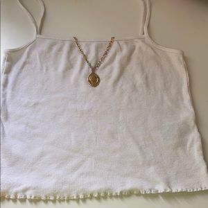 A white lettuce top (necklace not included)